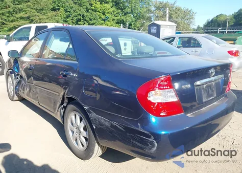 2003 Toyota Camry Xle z USA, uszkodzony, nr VIN 4T1BE30K03U232362